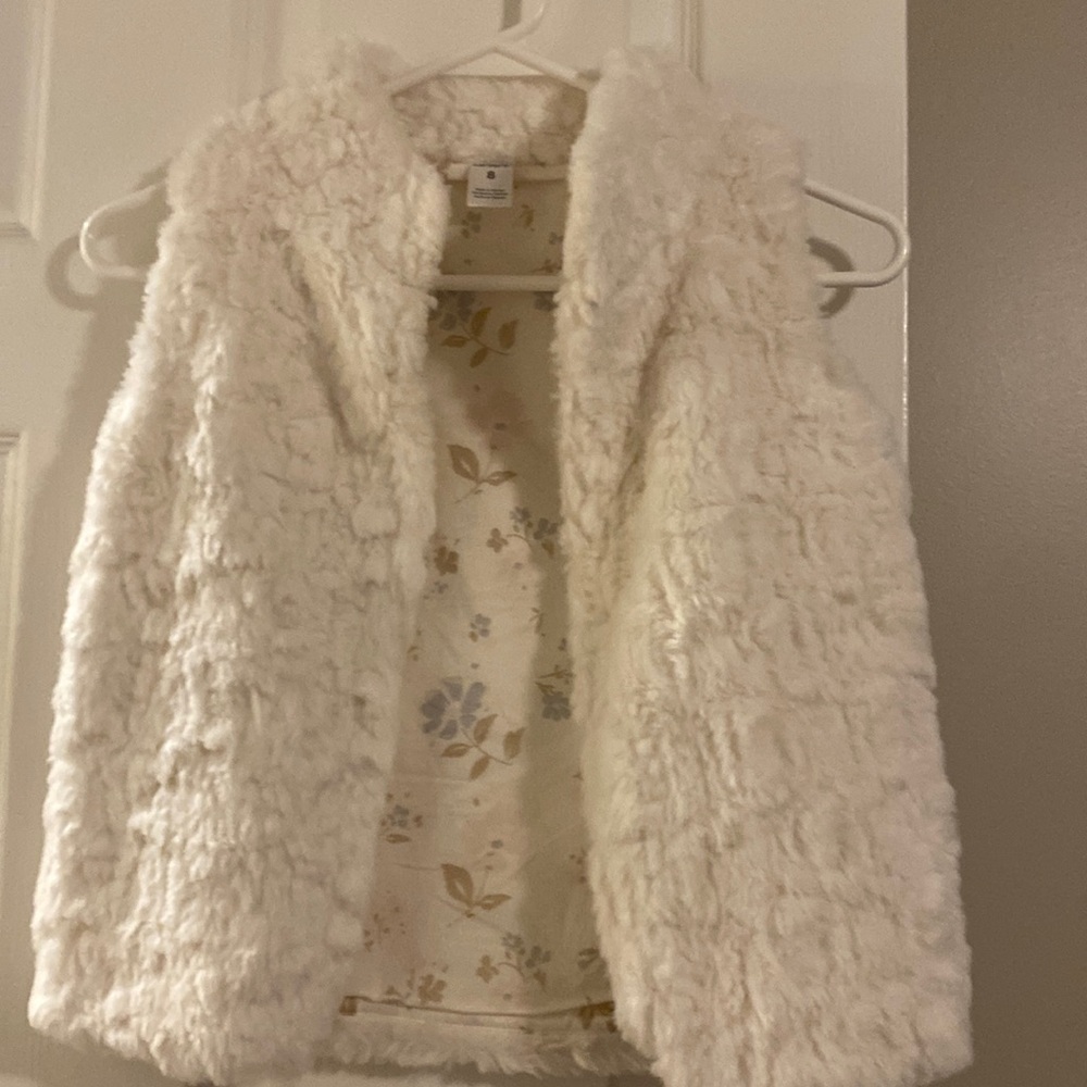Carters white fuzzy vest for girls size 8.  Excellent condition.